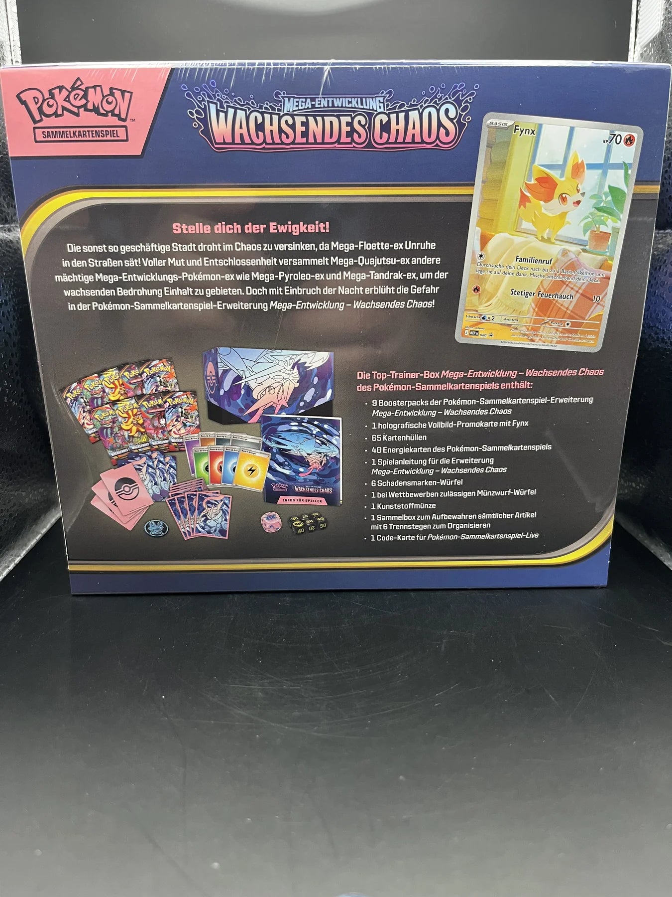 Pokémon Wachsendes Chaos Top Trainer Box Rückseite mit Boxinhalt